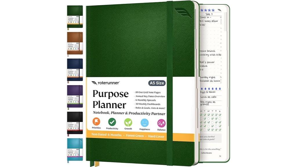 green hardcover goal planner
